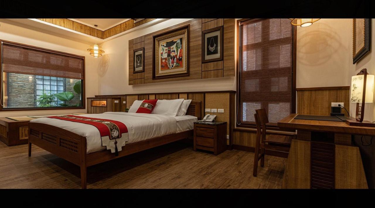 Apartamento 山花映水紅莊園民宿 Yuemei Exterior foto